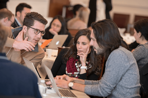 Harvard researchers discuss a marketing summary at the 2018 Bench-to-Business Boot Camp. Image credit Tony Rinaldo Photography.