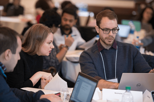 Harvard researchers discuss a marketing summary at the 2018 Bench-to-Business Boot Camp. Image credit Tony Rinaldo Photography.
