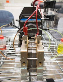 A prototype flow battery, pictured in the lab at Harvard SEAS. Image credit Eliza Grinnell.