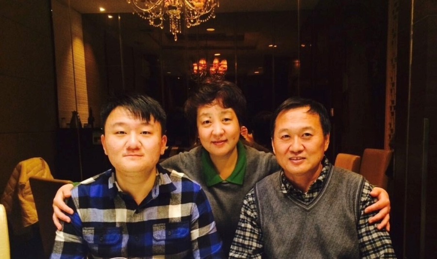 Liang Chang and his parents